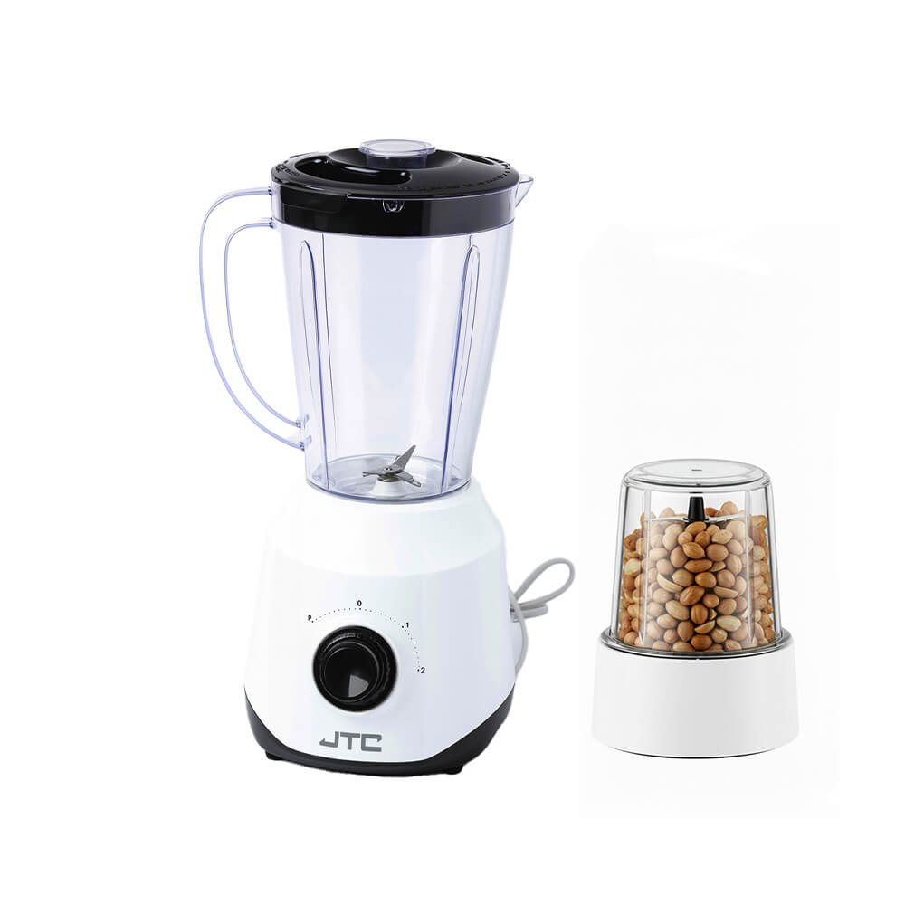JTC 400W blender with white base, clear 1.5L jar, black lid, stainless steel blades, and speed control dial on kitchen counter
